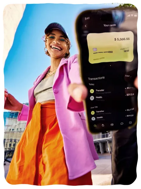 Girl in pink holding phone app